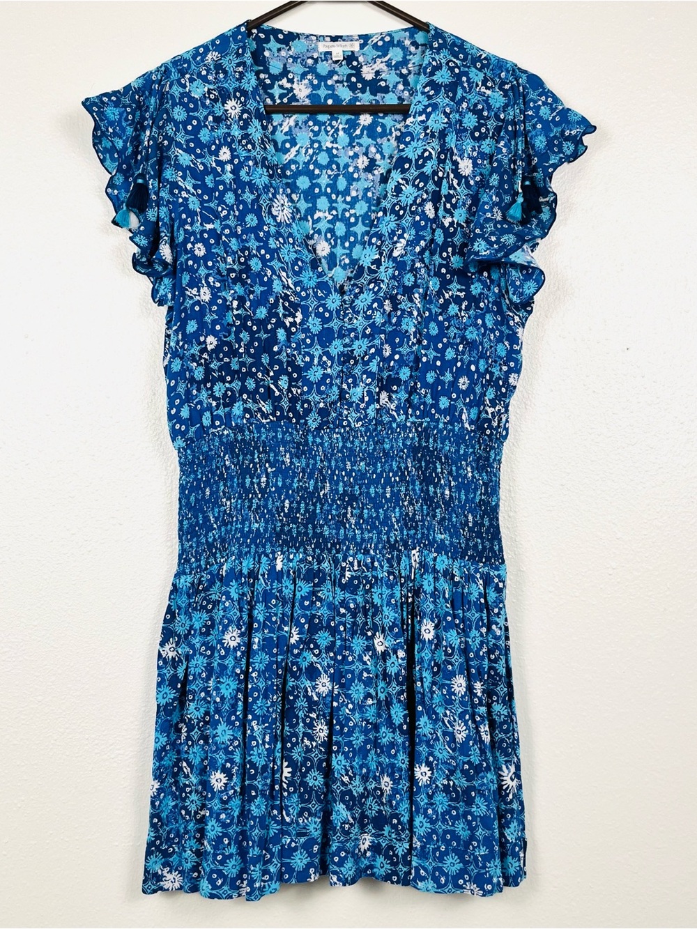 Poupette St Barth Medium Blue Floral Smocked Flutter Sleeve Tasseled Mini Dress